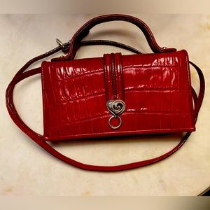 Brighton wallet on a string red beautiful condition. authentic.